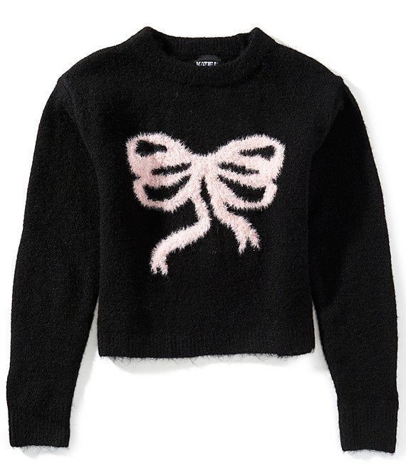 Black sweater with a pink bow design on a white background