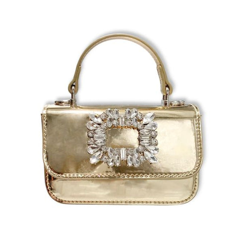 Gold handbag with a prominent crystal embellishment on a white background