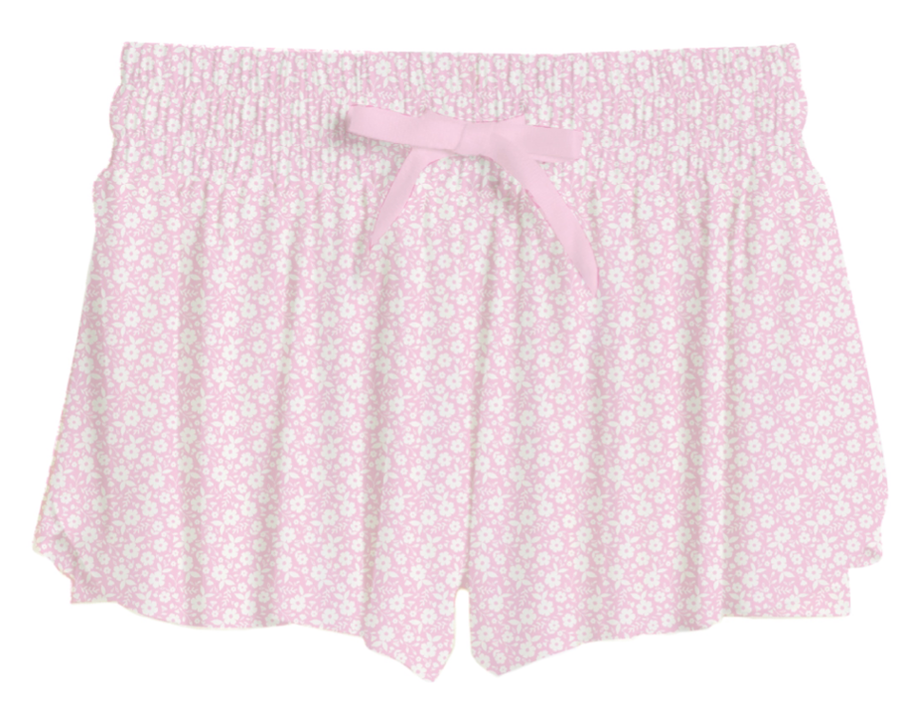 Pink floral shorts with a tie on a white background