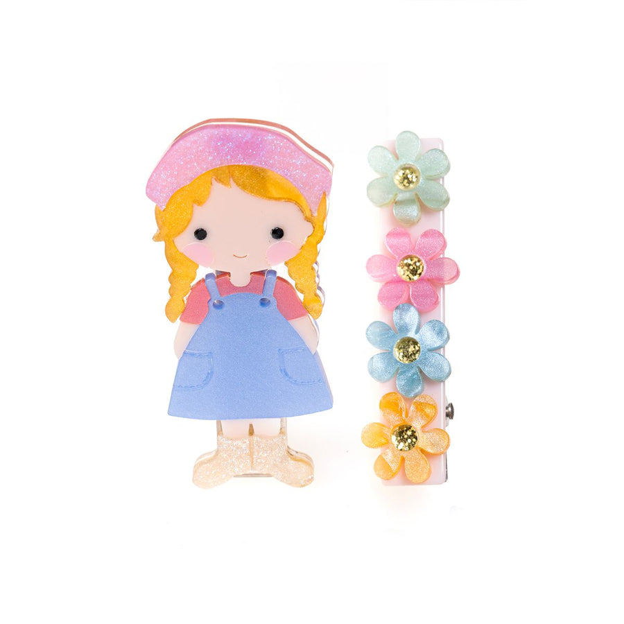 set of 2 clips: young girl in overalls and one clip with pastel daisies 