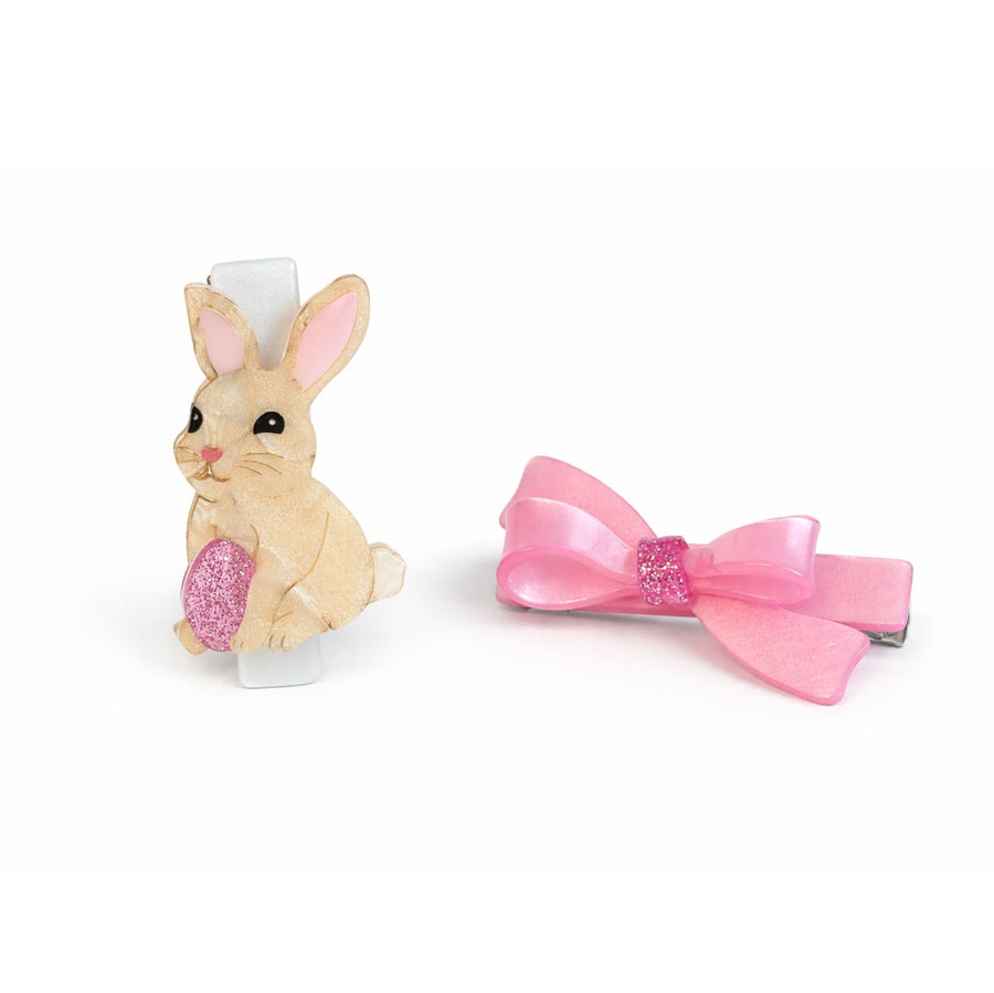Bunny-shaped hair clip with a pink bow on a white background