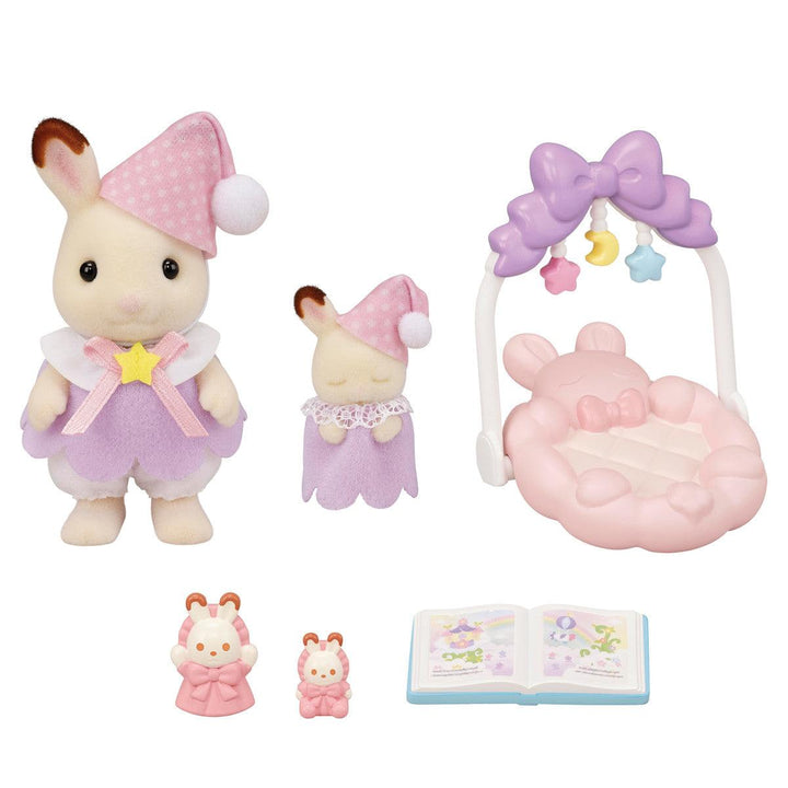 this picture shows all of the components to the playset: big sister bunny , baby bunny and bunny wing with book and cuddle toys