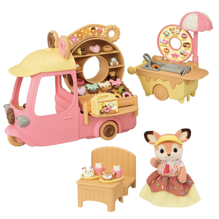 calico critters set with a donut shop theme. a deer as the operator an a truck with all of the donuts and equiptment to sell donuts!