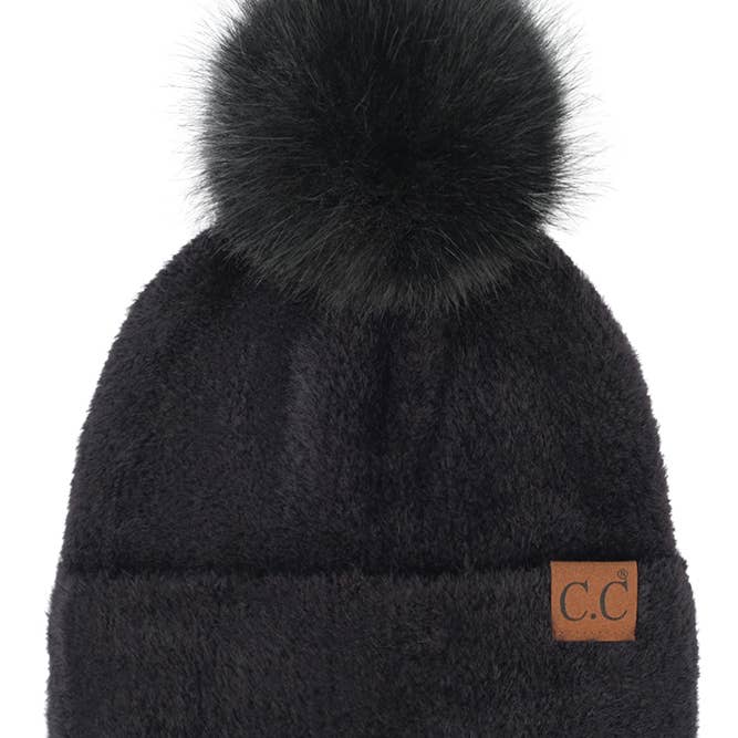 black chenille beanie with pom pom on the top. 