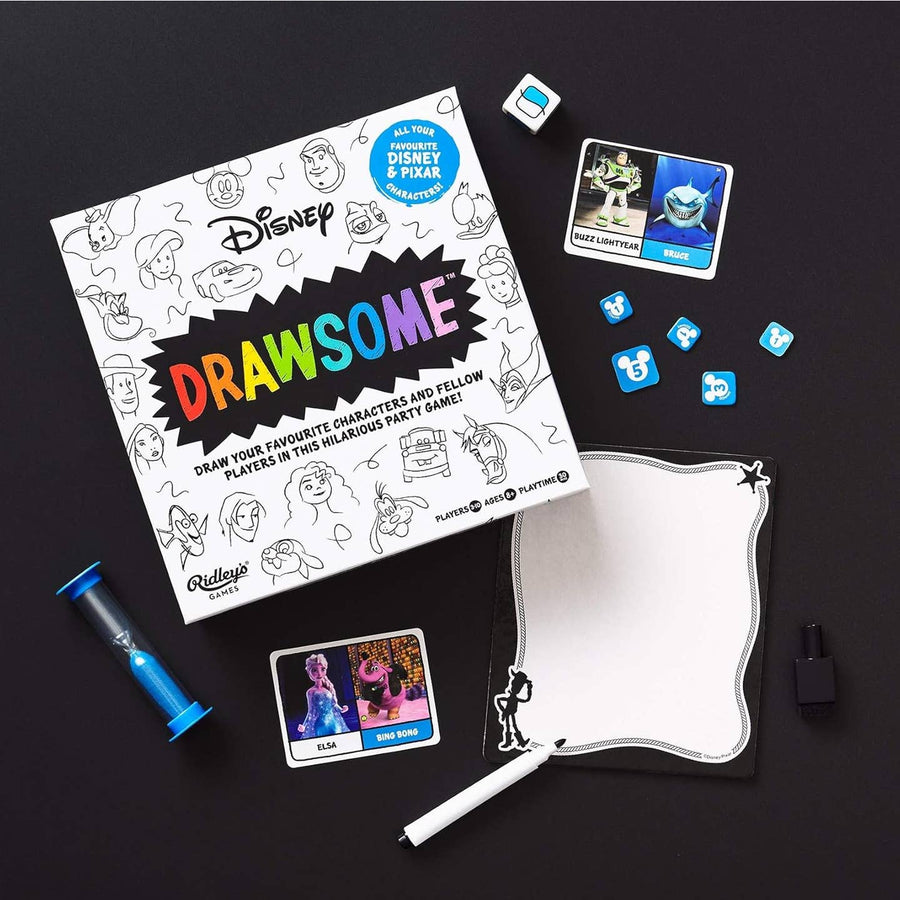 Disney 'Drawsome' game set with cards, dice, and drawing paper on a dark background