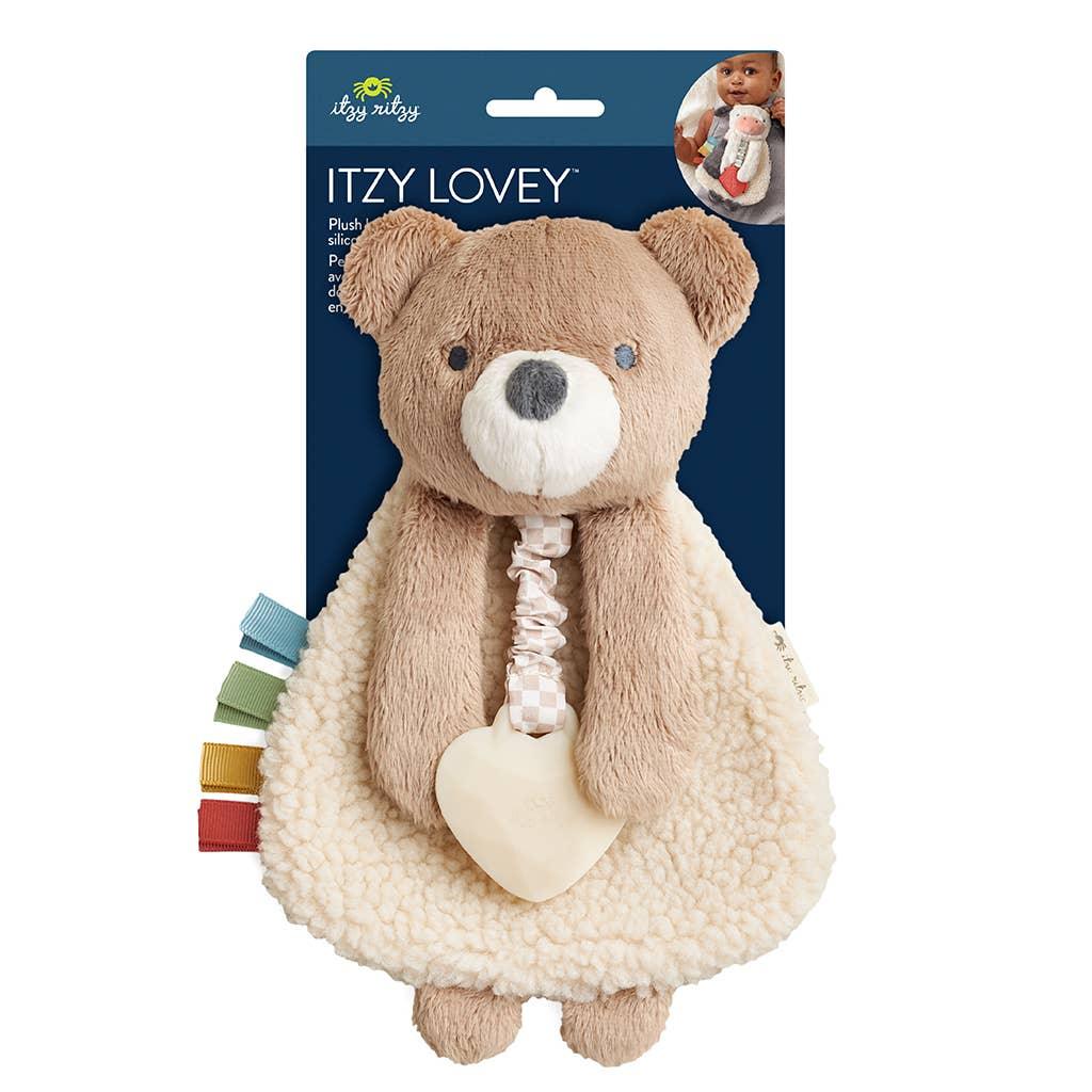 plush bear with silicone teether attached to the bear. brown bear with beige sherpa body. 