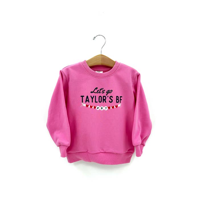 Bubblegum Sweatshirt that says "lets go Taylor&