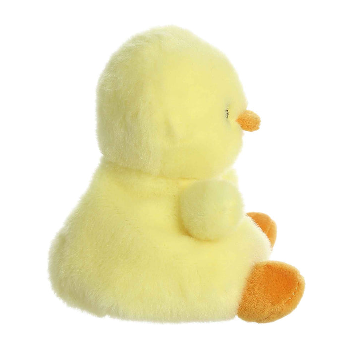 Yellow plush duck toy on a white background