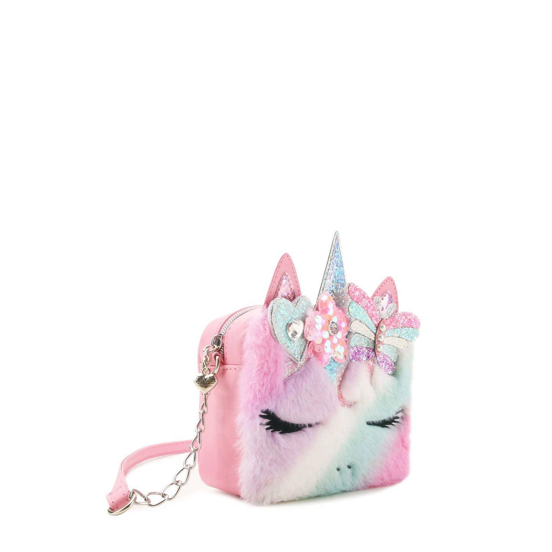 side of bag with unicorn face, unicorn horn and glitter butterfly. 