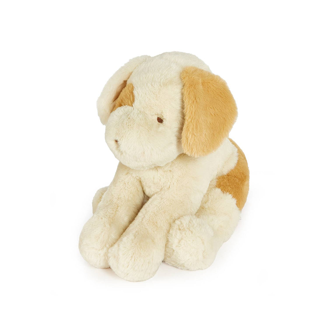 Plush toy dog with beige and brown fur on a white background