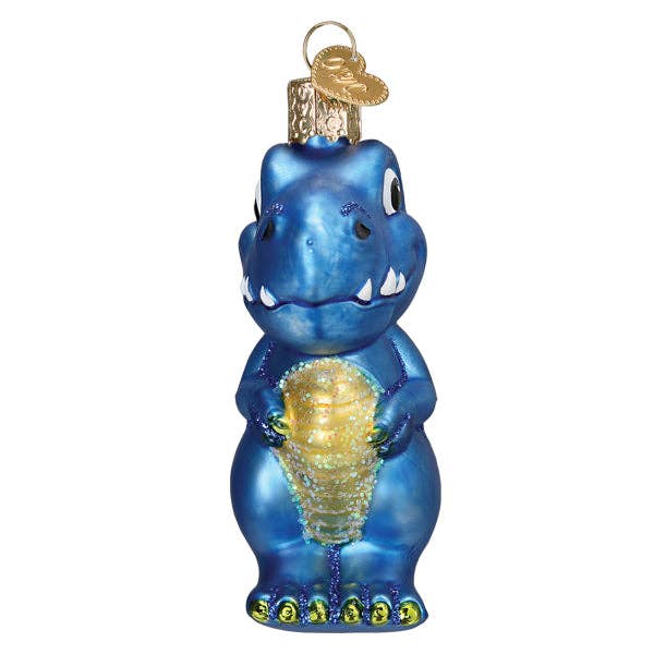 Blue dinosaur-shaped ornament with a gold shell on a white background