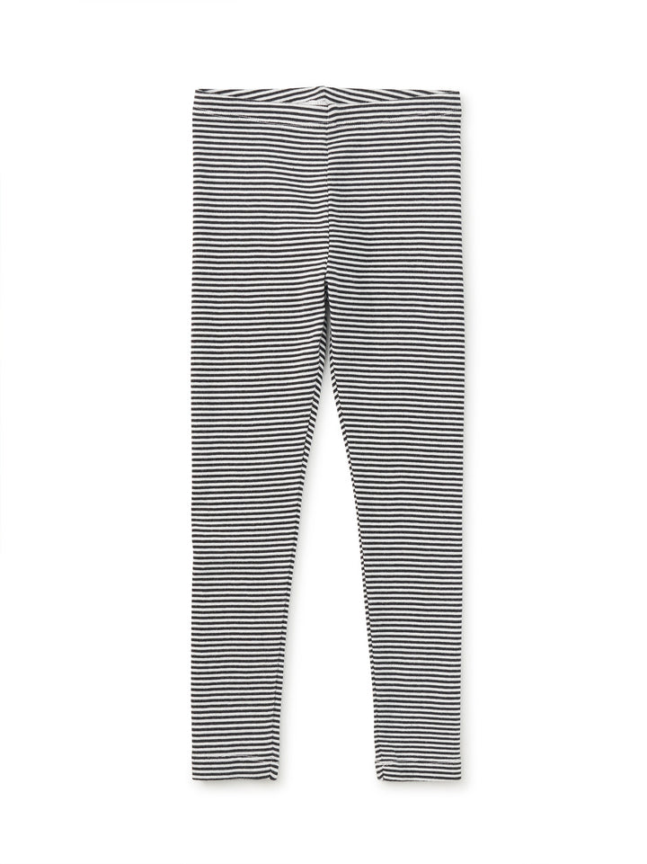 Black and white striped leggings on a white background