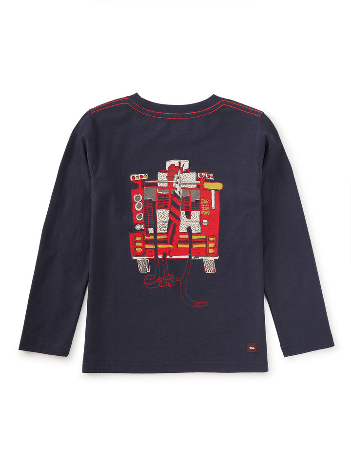 Navy long-sleeve shirt with red fire truck graphic design on a white background