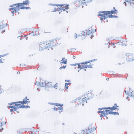 close up of the airplane pattern on the romper 