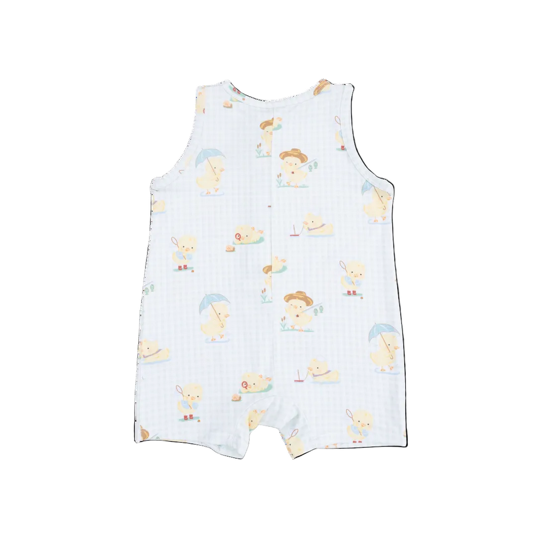 Baby romper with cartoon duck print on a white background