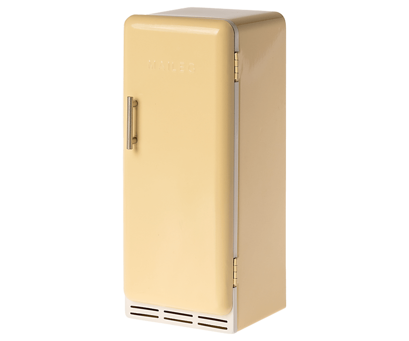 Vintage inspired refrigerator in a mild yellow color