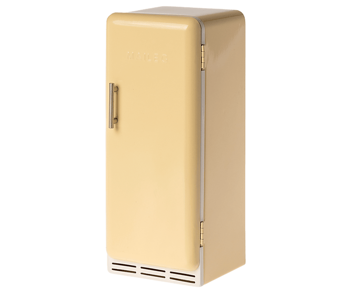 Vintage inspired refrigerator in a mild yellow color