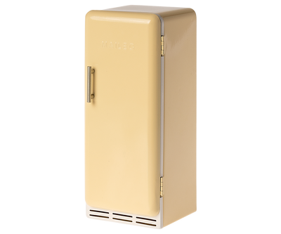 Vintage inspired refrigerator in a mild yellow color