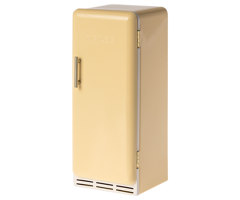 Vintage inspired refrigerator in a mild yellow color