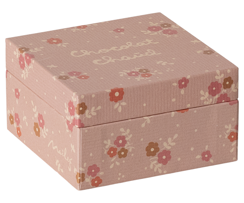 close up of the pink floral box, pretty vintage floral on the outside. 