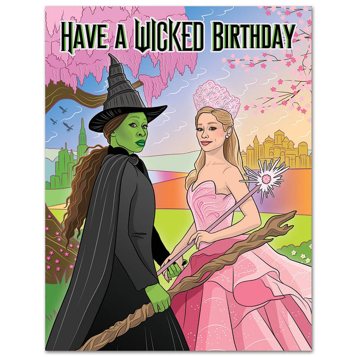 Cartoon-style birthday card with two characters, one in a witch costume and the other in a pink dress, against a colorful background.