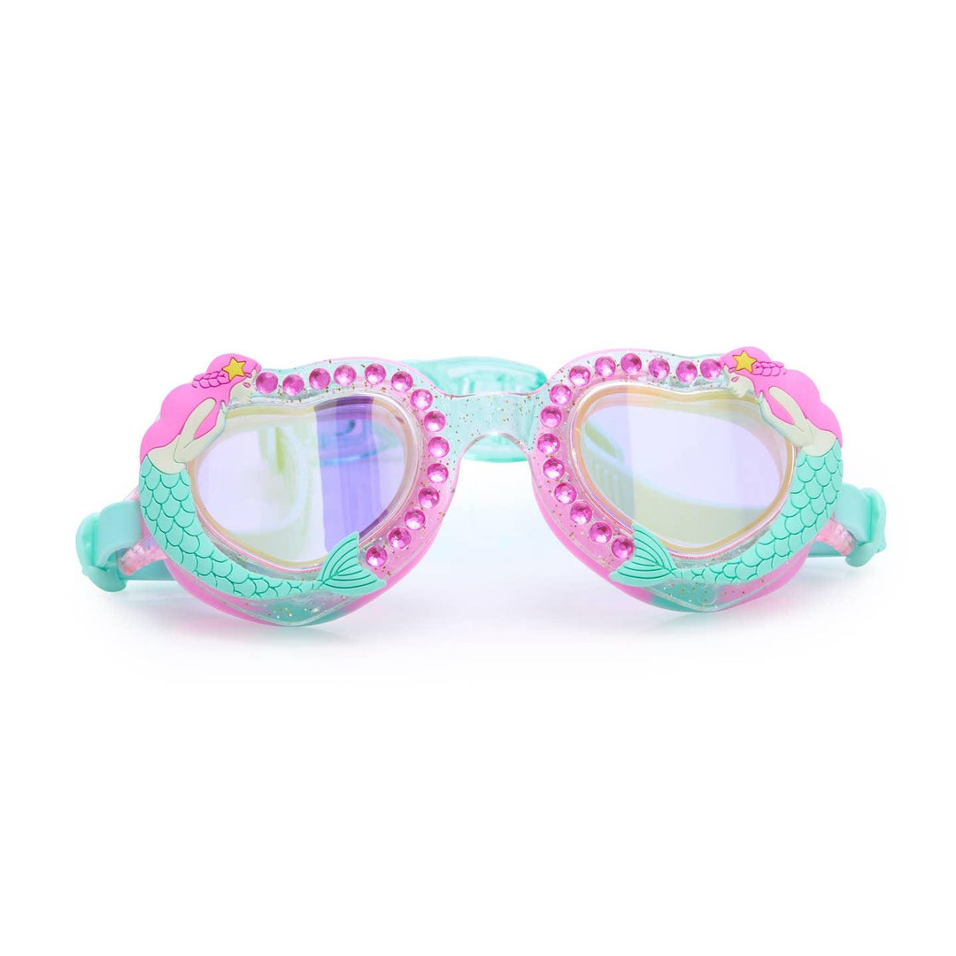 swim goggles with pink rhinestones along the edge and meramids along the outer edge of the goggles. 