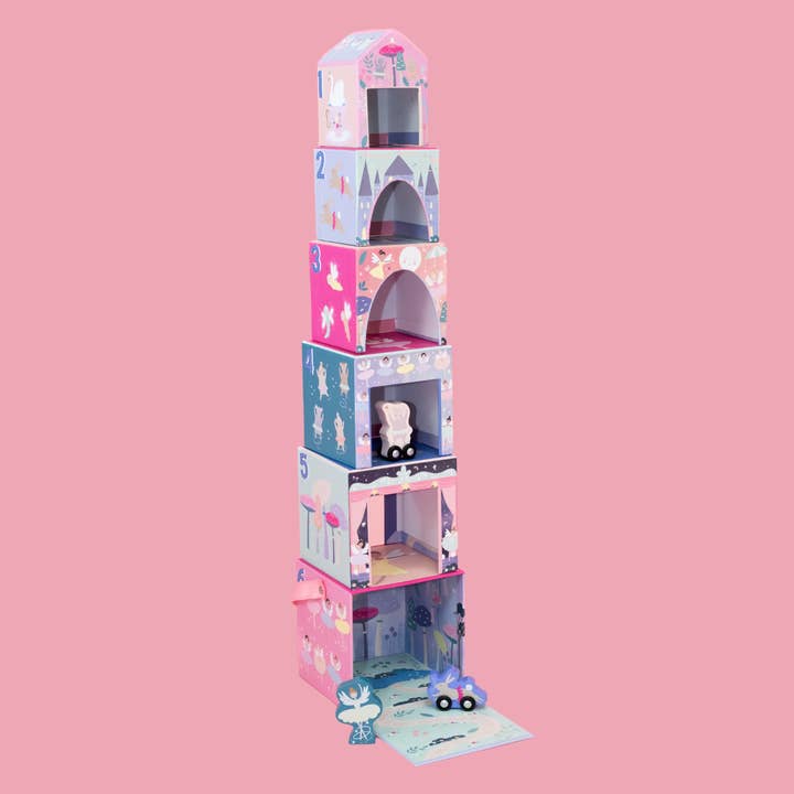 stacking cube toy that is theme in dance and ballet with dancers and bunnies on wheels to travel through the cubes