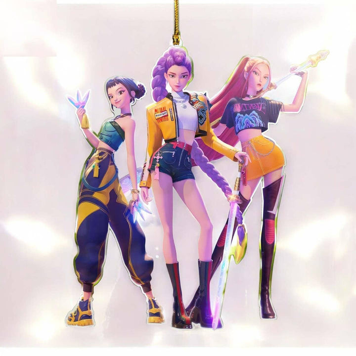 Three colorful character figurines hanging against a white background