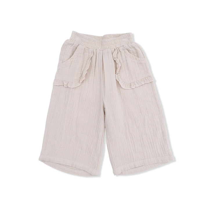 Beige wide-leg pants with ruffled details on a white background