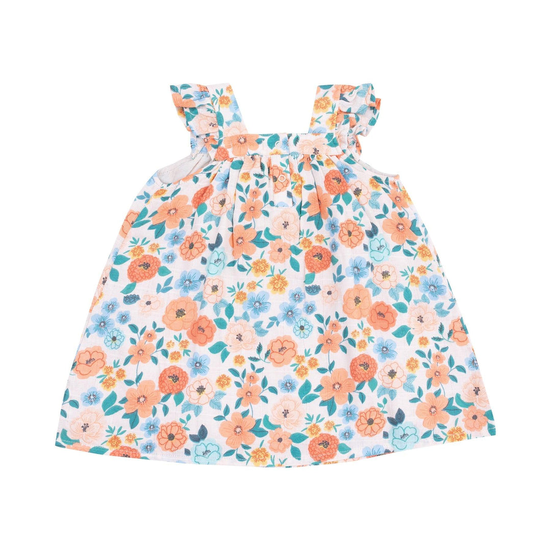 back of girls floral a-line dress with ruffles at the sleeves. turquoise, peach and orange flowers all over it. 