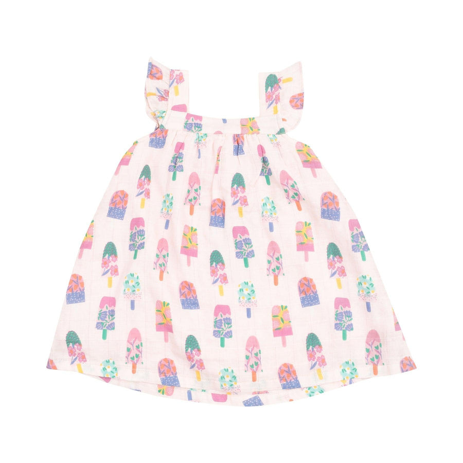 light pink sundress with ruffles at the sleeve and floral popsicle print all over the dress. sleeveless. 