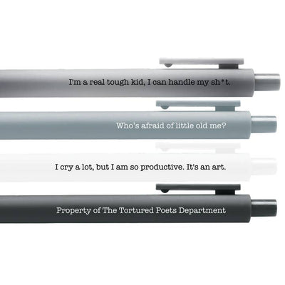 close up view of the writing on the pens that correspond to Taylor Swift's Tortured Poets Dept album