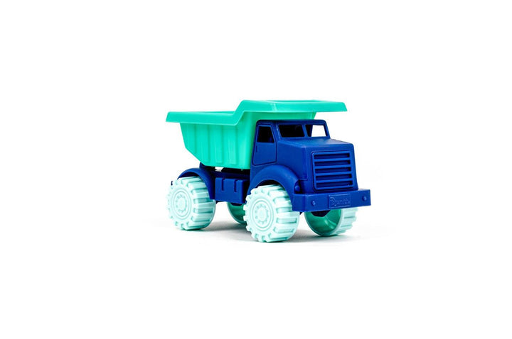 blue and green dump truck made of plastic, good for outdoor use. 