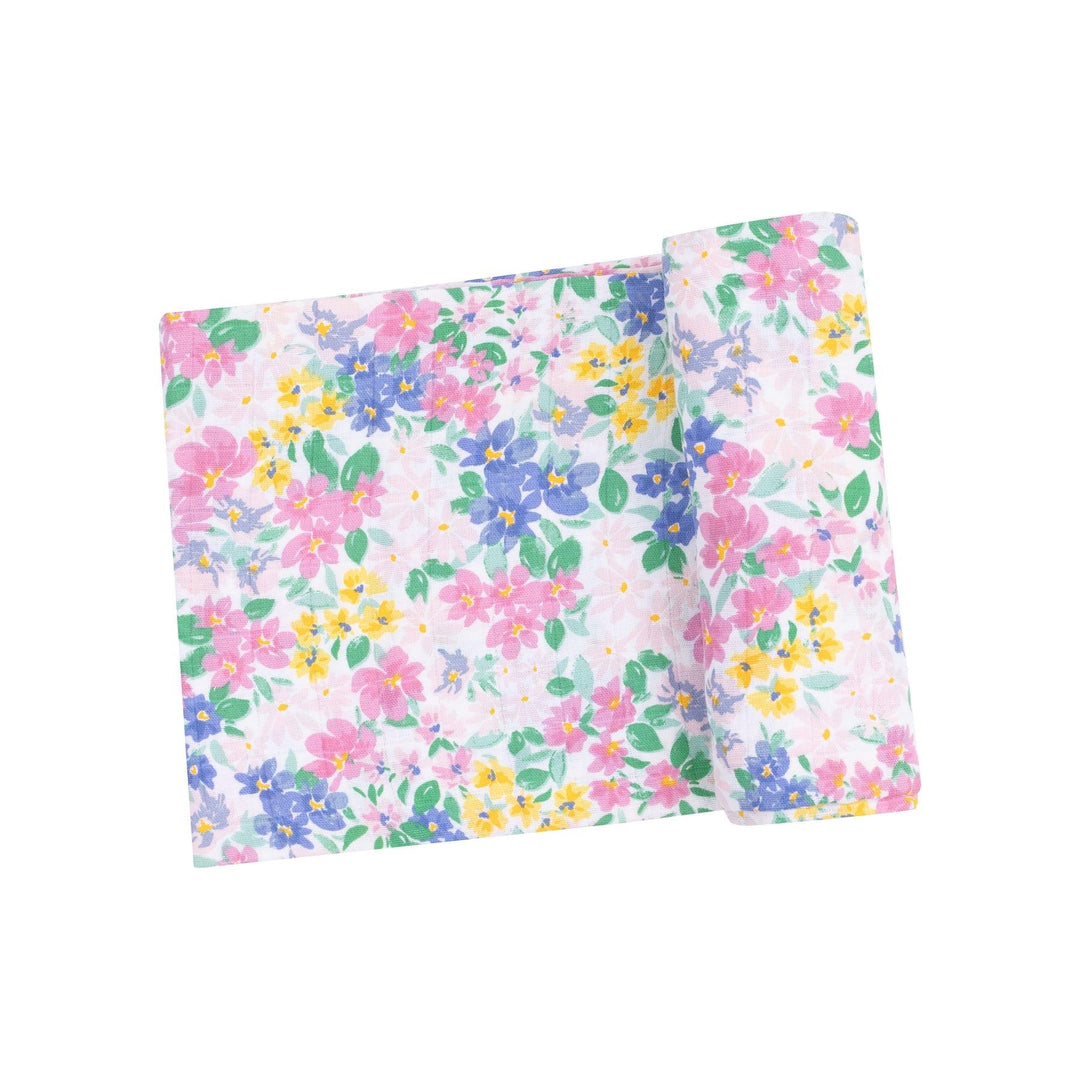 pastel floral swaddle with tiny flowers in shades of pink, blue and yellow. 