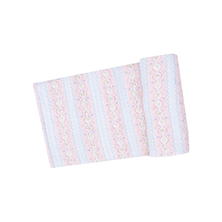 ogee floral swaddle with blue stripes and pink floral stripes. 