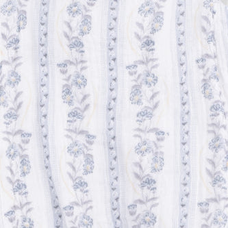 White baby romper with blue/ gray floral pattern on a white background