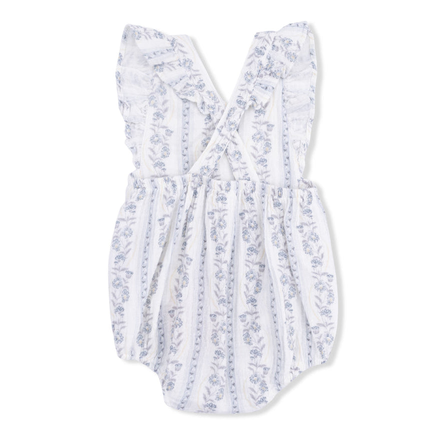 White baby romper with blue/gray floral pattern on a white background