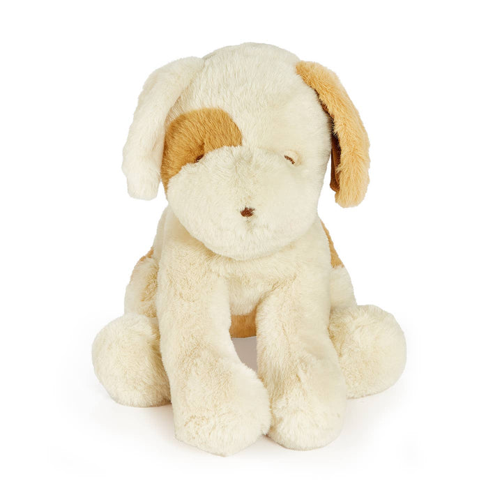 Plush toy dog with cream fur and brown ears on a white background