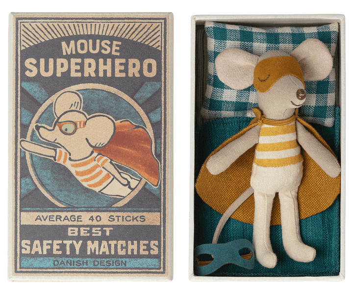little brother mouse sleeping in a matchbox dressed as a superhero