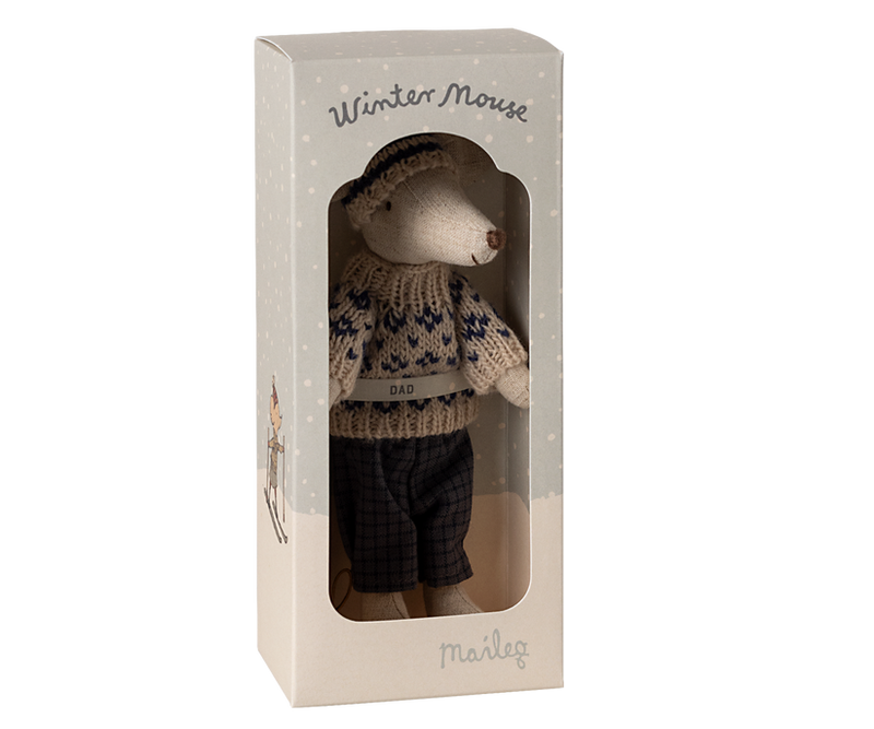 dad mouse dressed in winter attire in the packaging the mouse comes in. 