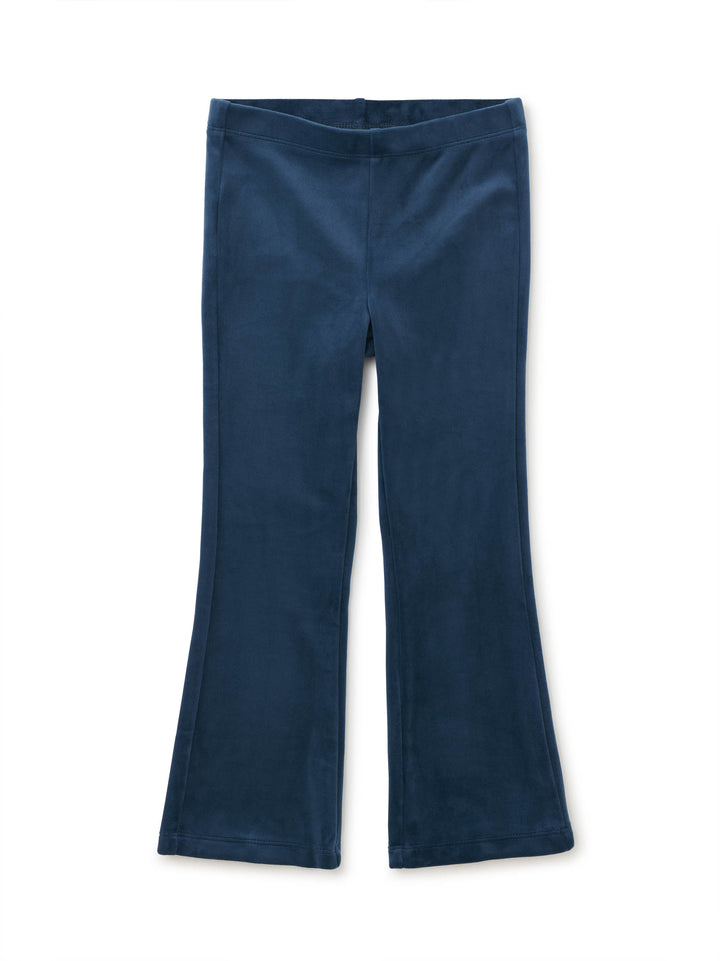 Navy blue velour pants on a white background