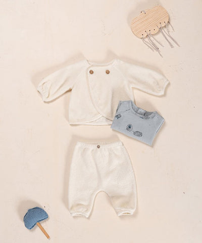 baby 2 piece set, fuzzy feel with a double button closure at the neckline. 