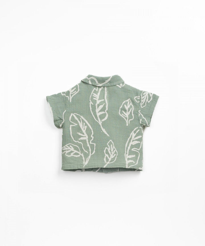 sage green short sleeve shirt with ivory leaf print
