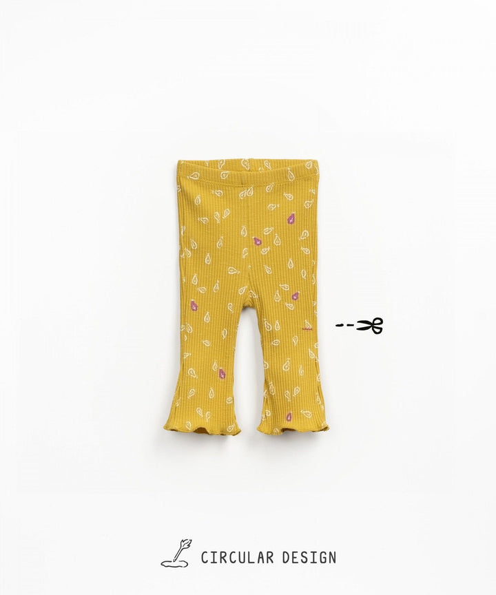 mustard gold color, slight flare pant, ribbed cotton fabric with small leaf design on the pants. 