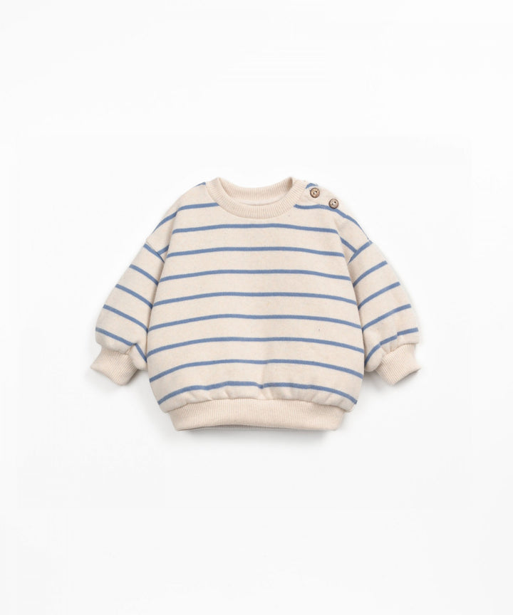 Striped sweater with blue lines on a white background