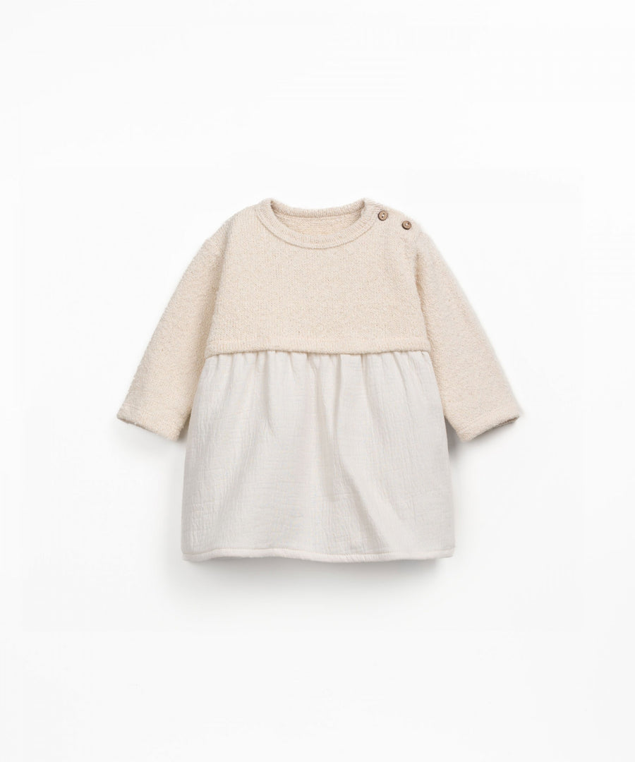 Two-tone dress with beige dress with top and white skirt on a white background