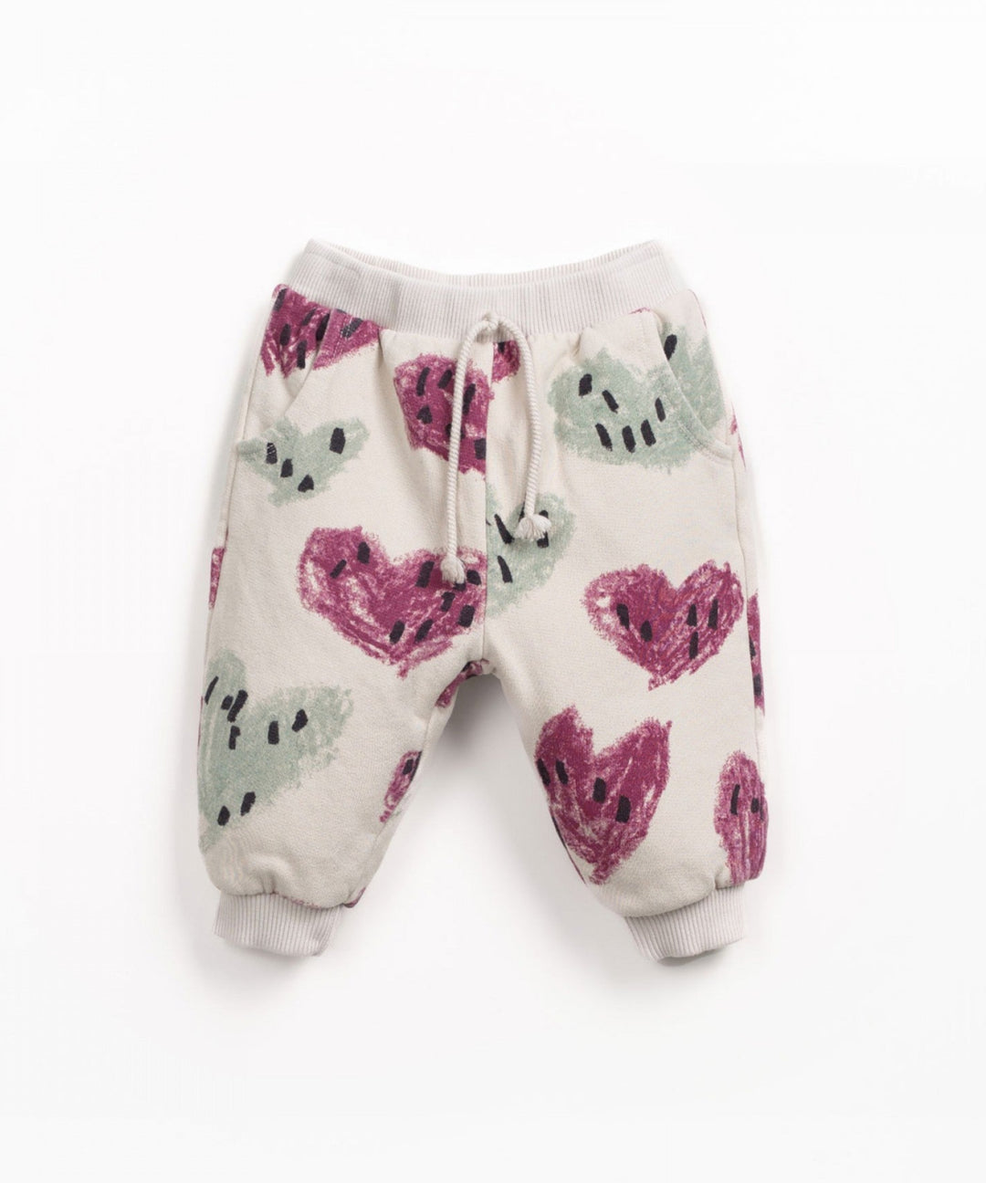 Children's pants with heart pattern on a white background