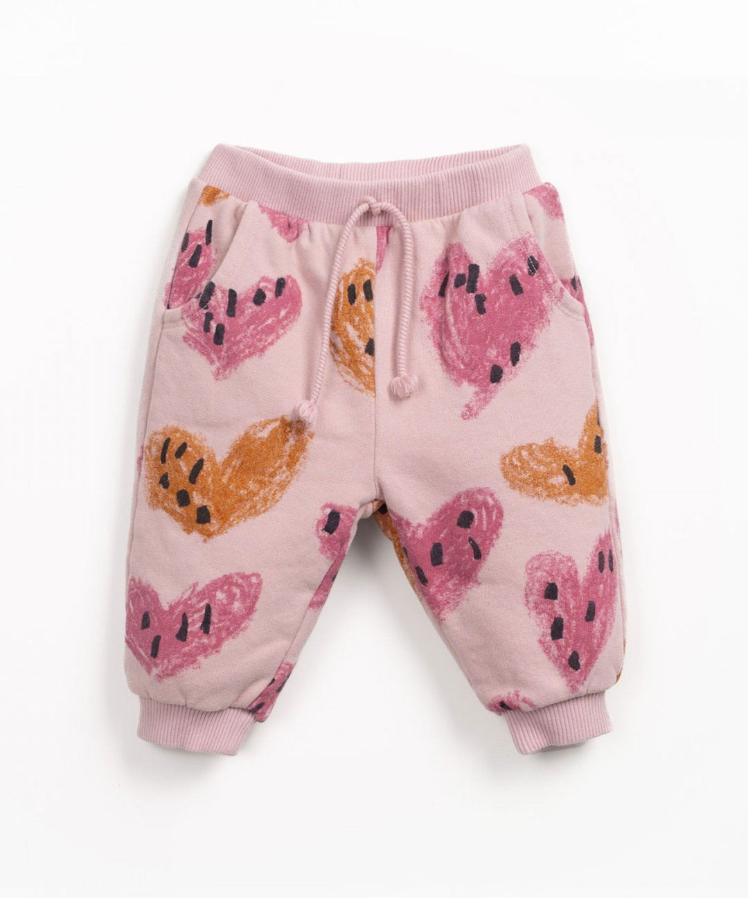 Pink baby pants with hearts  on it 
