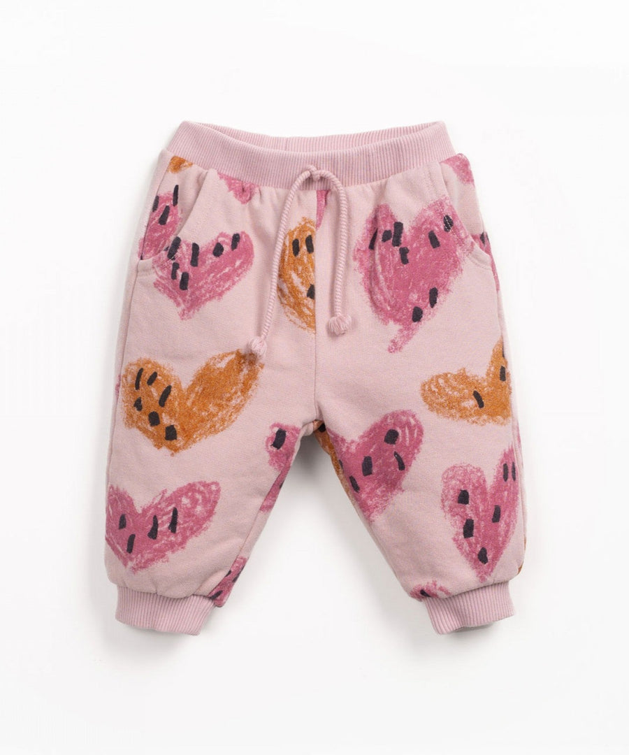 Pink baby pants with hearts  on it 