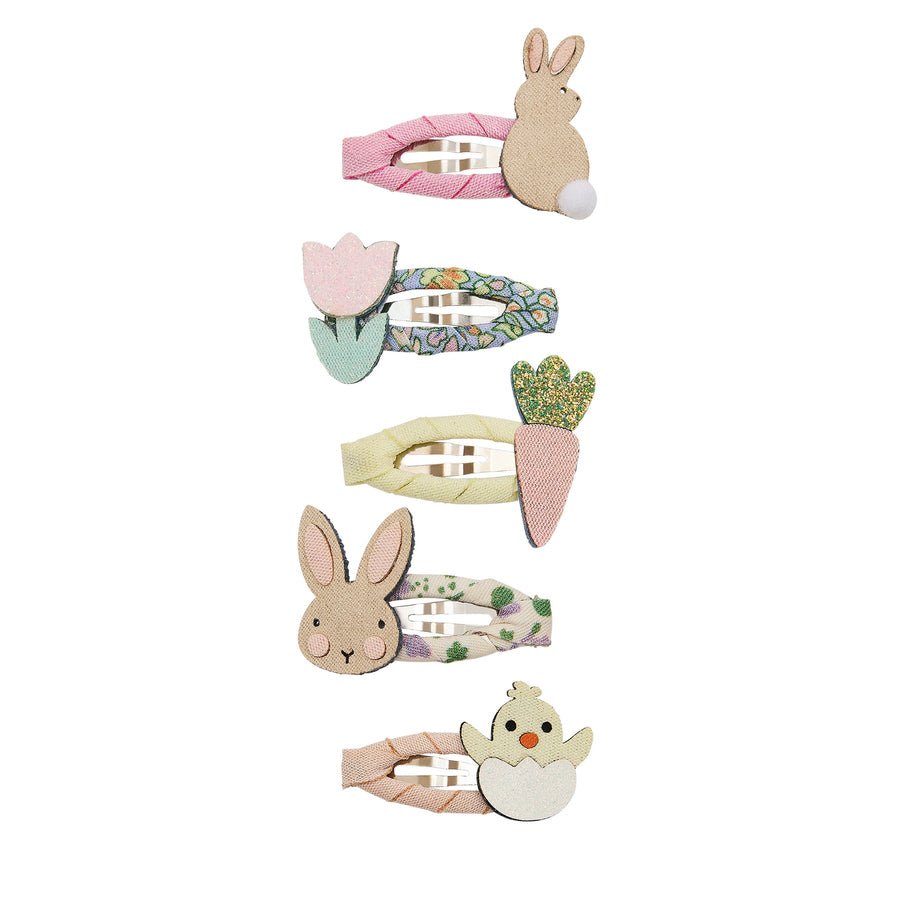 Set of colorful hair clips with animal designs on a white background